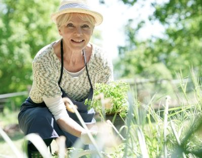 Senior woman gardening on beautiful spring day